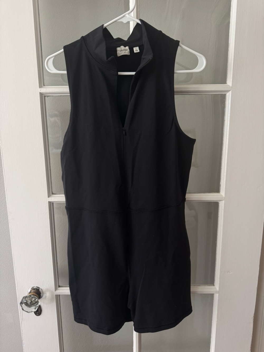 Aritzia - Black Sleeveless Mock Neck Zip Romper